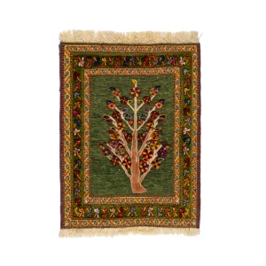 Gradient green kilim rug with tree design